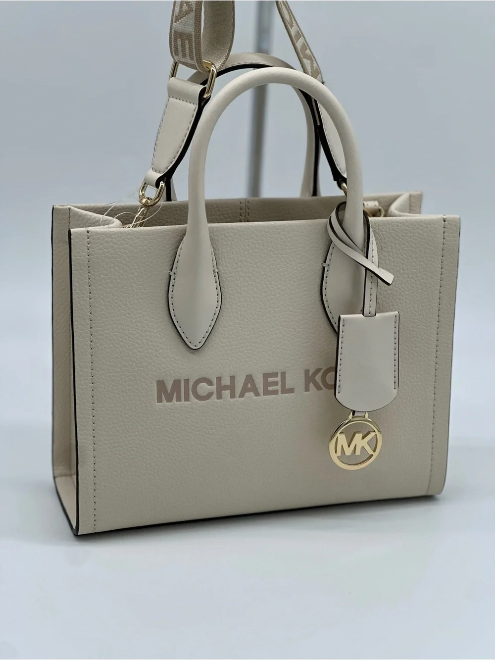 Michael Kors Cream Pebbled Leather Satchel with Logo Strap